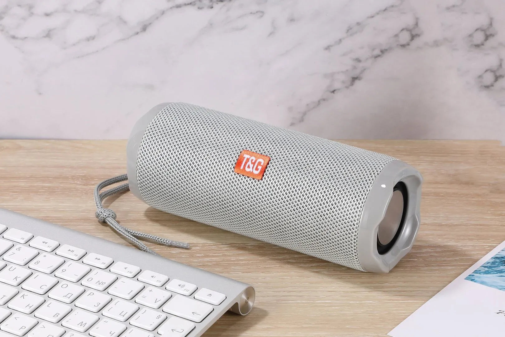 Portable fabric Bluetooth speaker with card holder in multiple colour options showing dimensions 182 x 73.5 x 69.2 mm