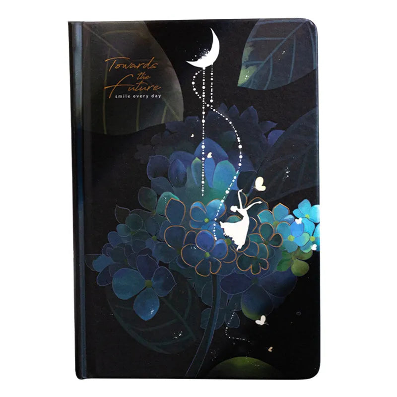 A5 size diary book with a luminous purple cover, open to show pages with colour illustrations.