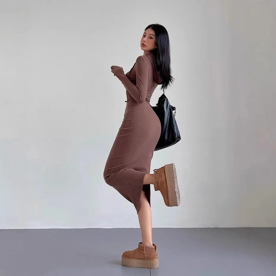 Women's grey hooded long sleeve sheath dress with a high waist and over-the-knee length.
