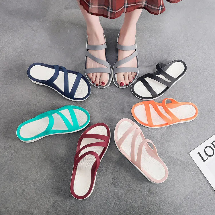 A pair of solid colour women's casual sandals with a breathable upper, shown in one of the six available colours.