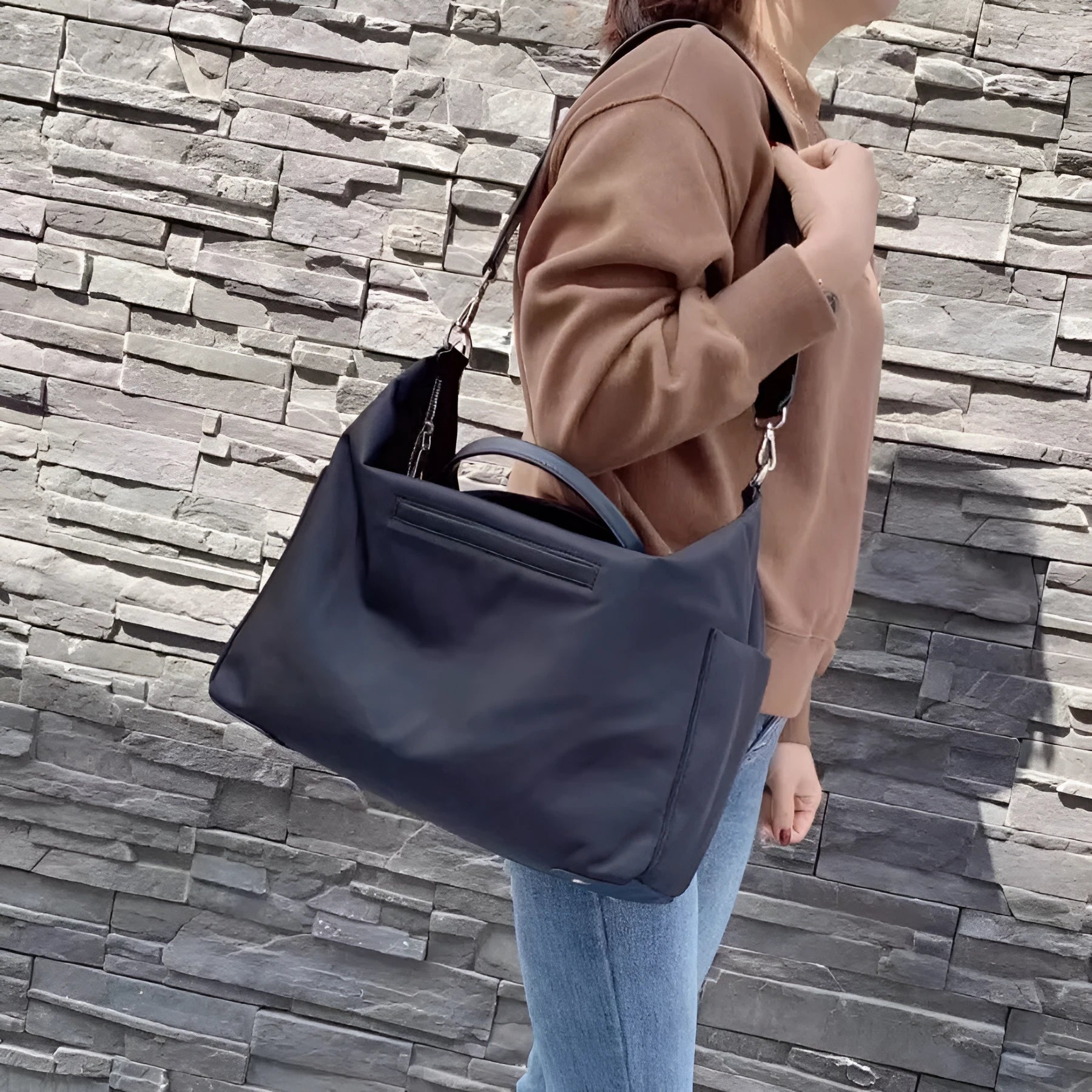 Nylon waterproof cloth shoulder bag with leather accents in black or light khaki colour