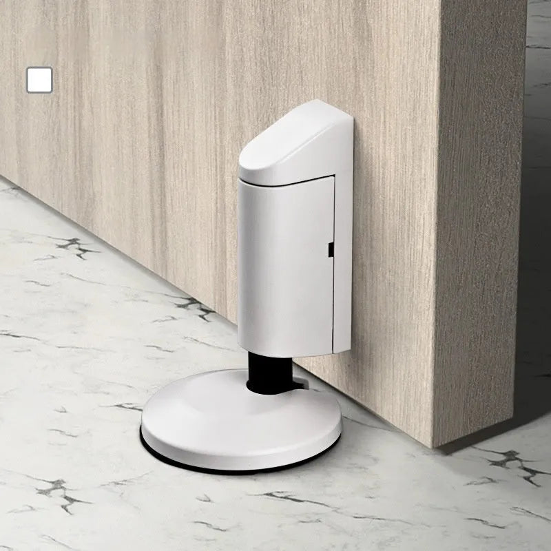 Zinc alloy invisible wedge door stopper with magnetic catch in six colour finishes.