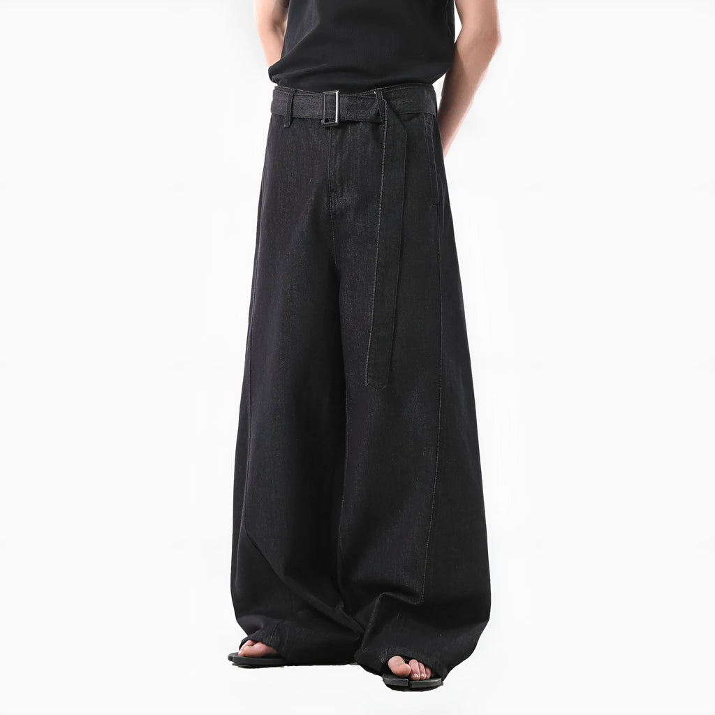Women's high-waist straight-leg jeans in a black gold wash denim, showing front zip and five-pocket design.