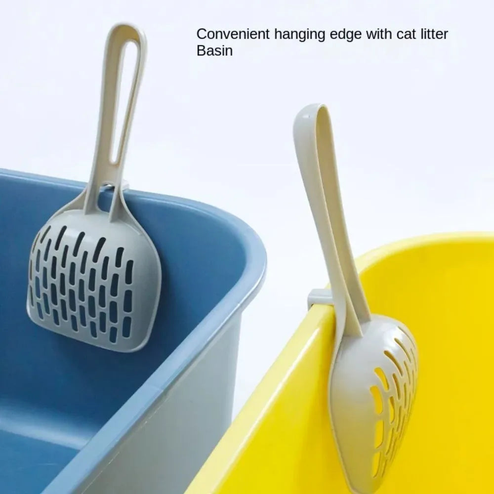 Grey plastic cat litter scoop with attached storage base, showing 4-hole sifter design.