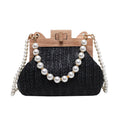 Women's woven straw shoulder bag with pearl chain strap showing interior organiser compartments