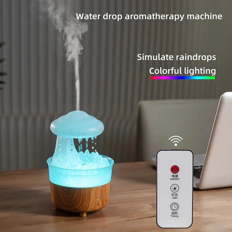 Wood grain white rain cloud shaped humidifier and essential oil diffuser with LED lights on a table.