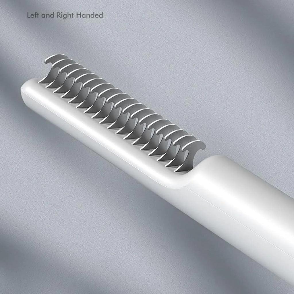 Stainless steel dog dematting comb with ergonomic handle in pink colour on white background