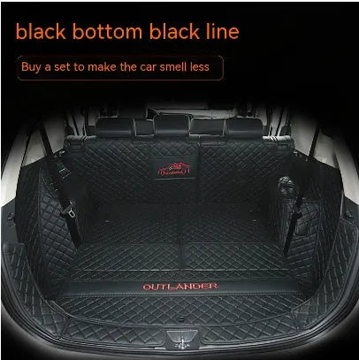 Mitsubishi Outlander custom boot liner with 3D raised edges and non-slip surface in a vehicle boot.