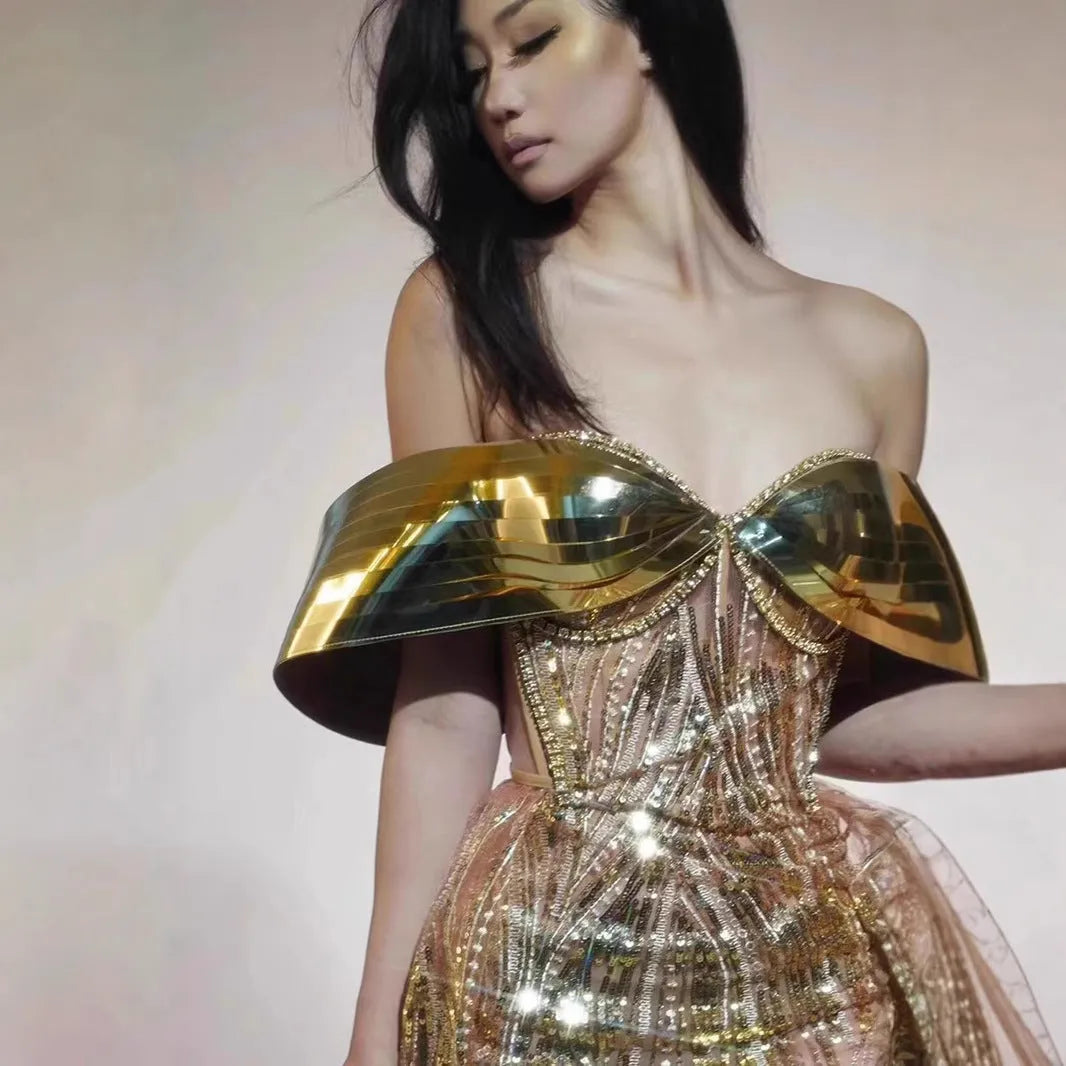 Gold strapless sequined dress with tulle skirt and thigh-high split for women's formal evening wear