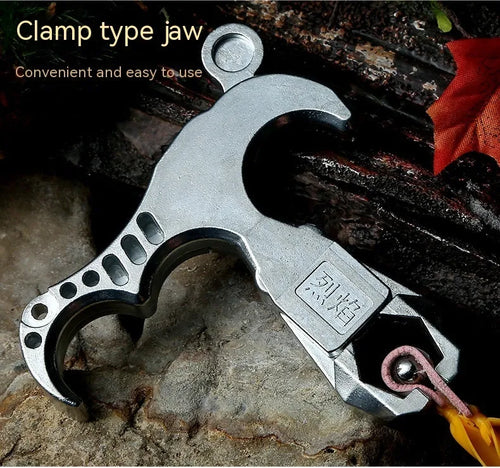 Zinc alloy archery release aid with a two-axis harpoon clip mechanism and stainless steel component.