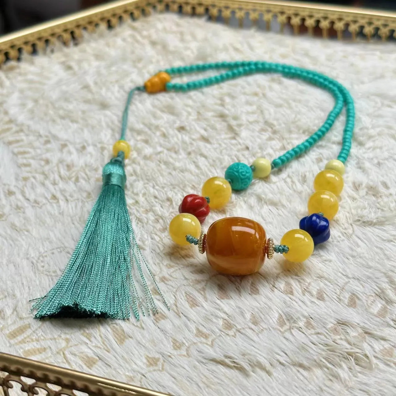 Turquoise mesh flower lucky pendant necklace with ball bead chain, adjustable length.