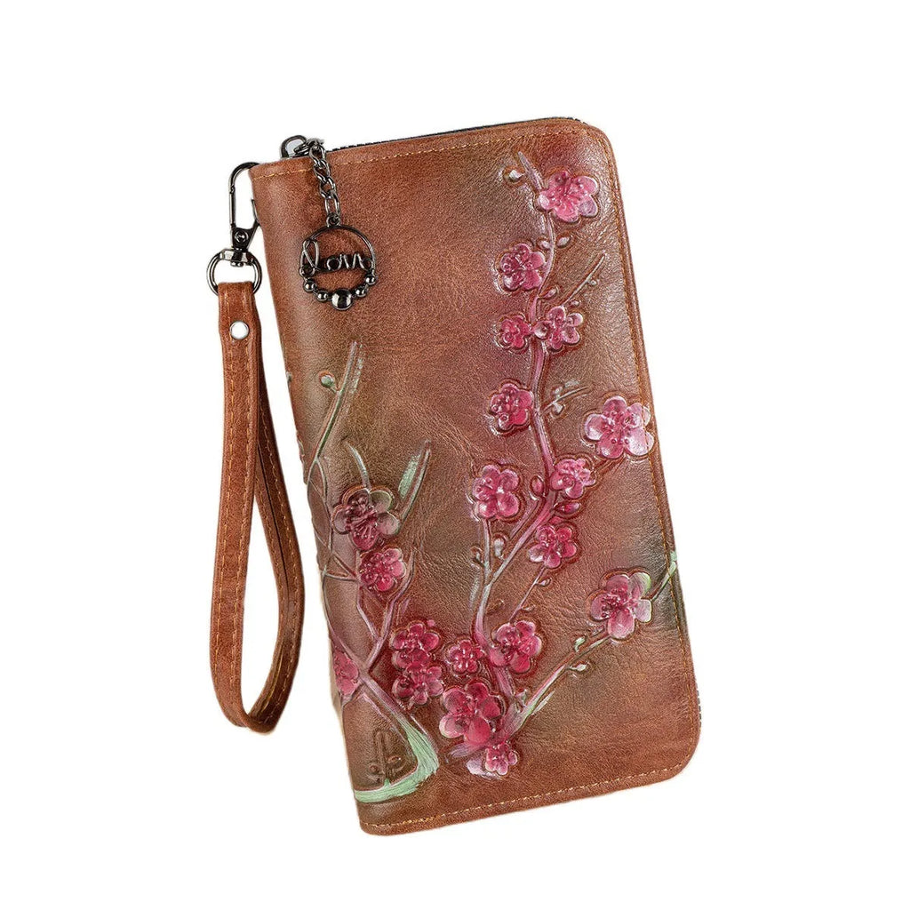 Embossed Chinese style handbag with floral pattern and zipper closure in black colour