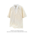 Men's apricot coloured polo shirt sweater with a structured heavy Henry collar and short sleeves