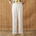 Women's linen straight-leg trousers with elasticated high waist and lace trim in navy blue colour.