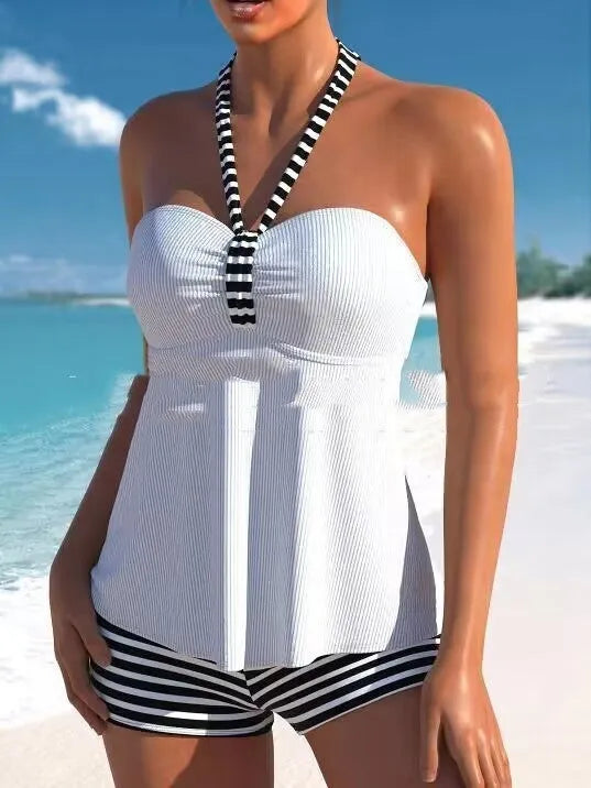 Women's off-shoulder swimsuit in black and white stripes and solid colours