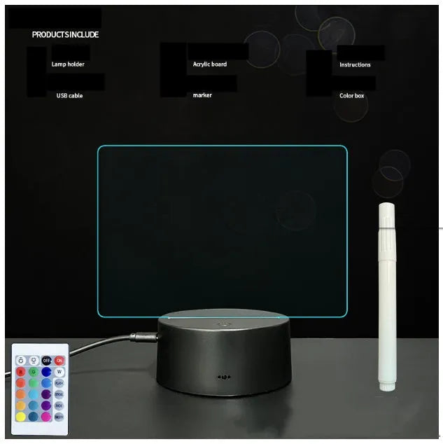 Black 3D acrylic message board LED light with remote control and marker pen on a desk.