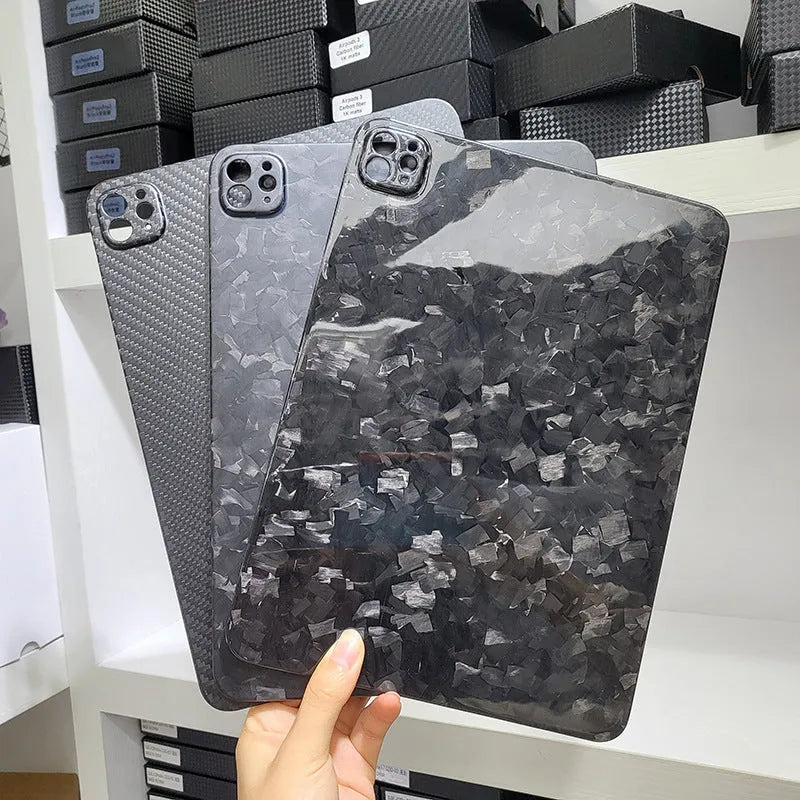 Carbon fibre hard protective case for Apple iPad Pro 11 showing embossed plaid pattern and choice of surface finishes.