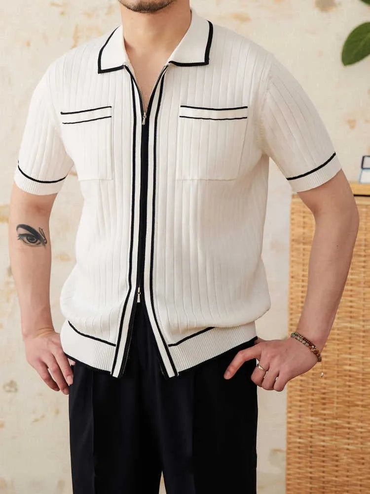 Slim fit black polo shirt with short sleeves and a lapel collar on a mannequin.