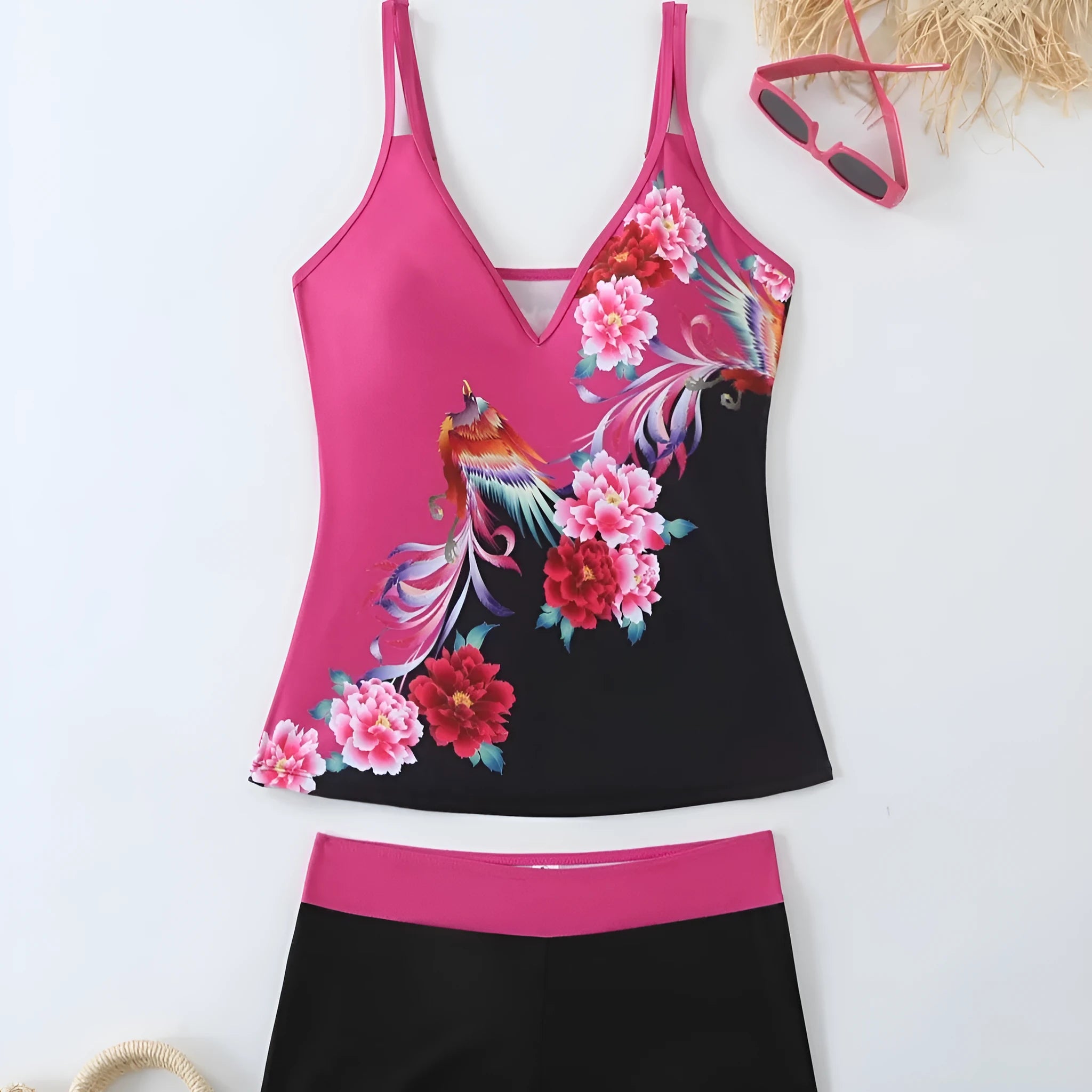 Plus size black printed swimsuit briefs for women on a hanger.
