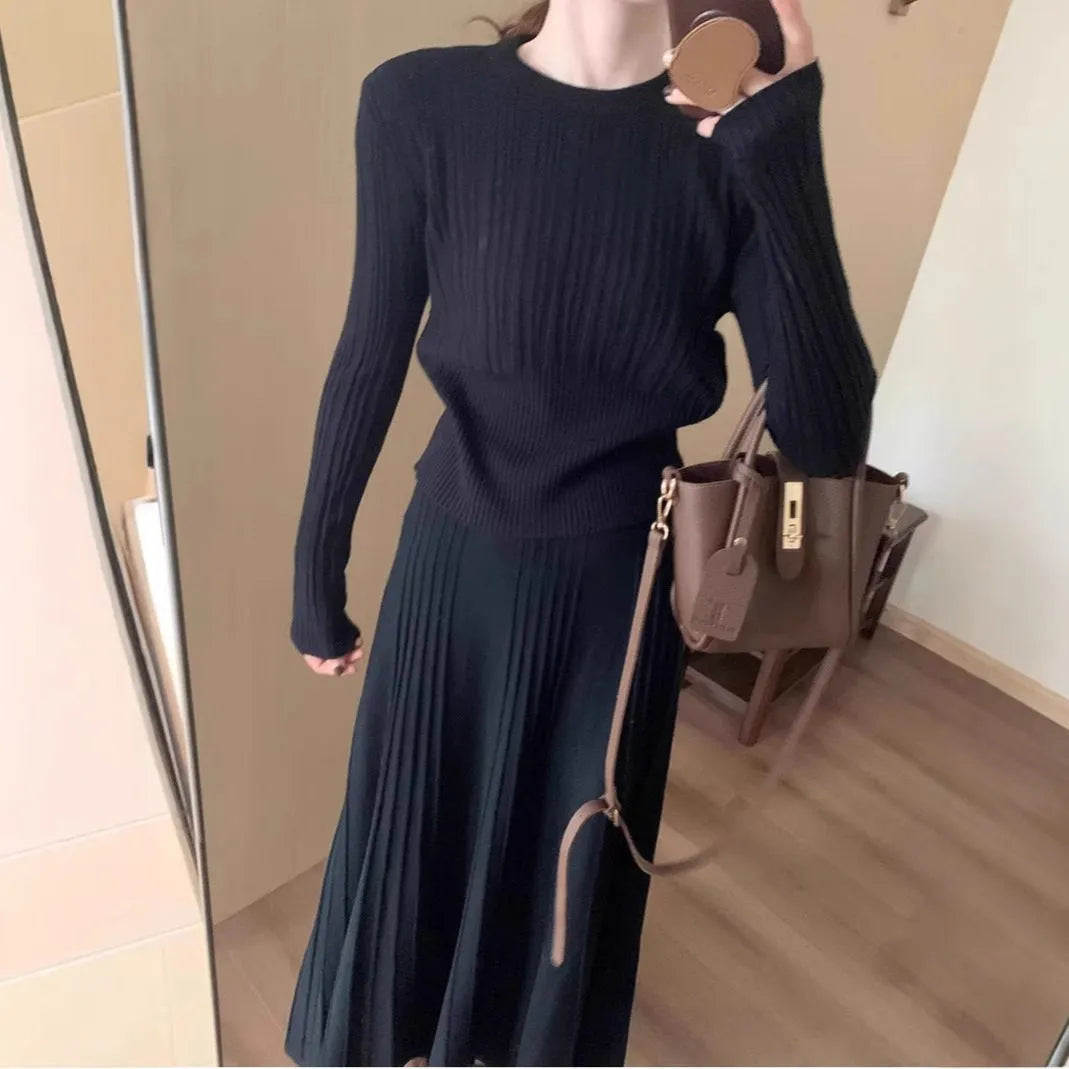 Dark grey knitted long dress suit with artistic retro 3D pattern, showing sweater and skirt.