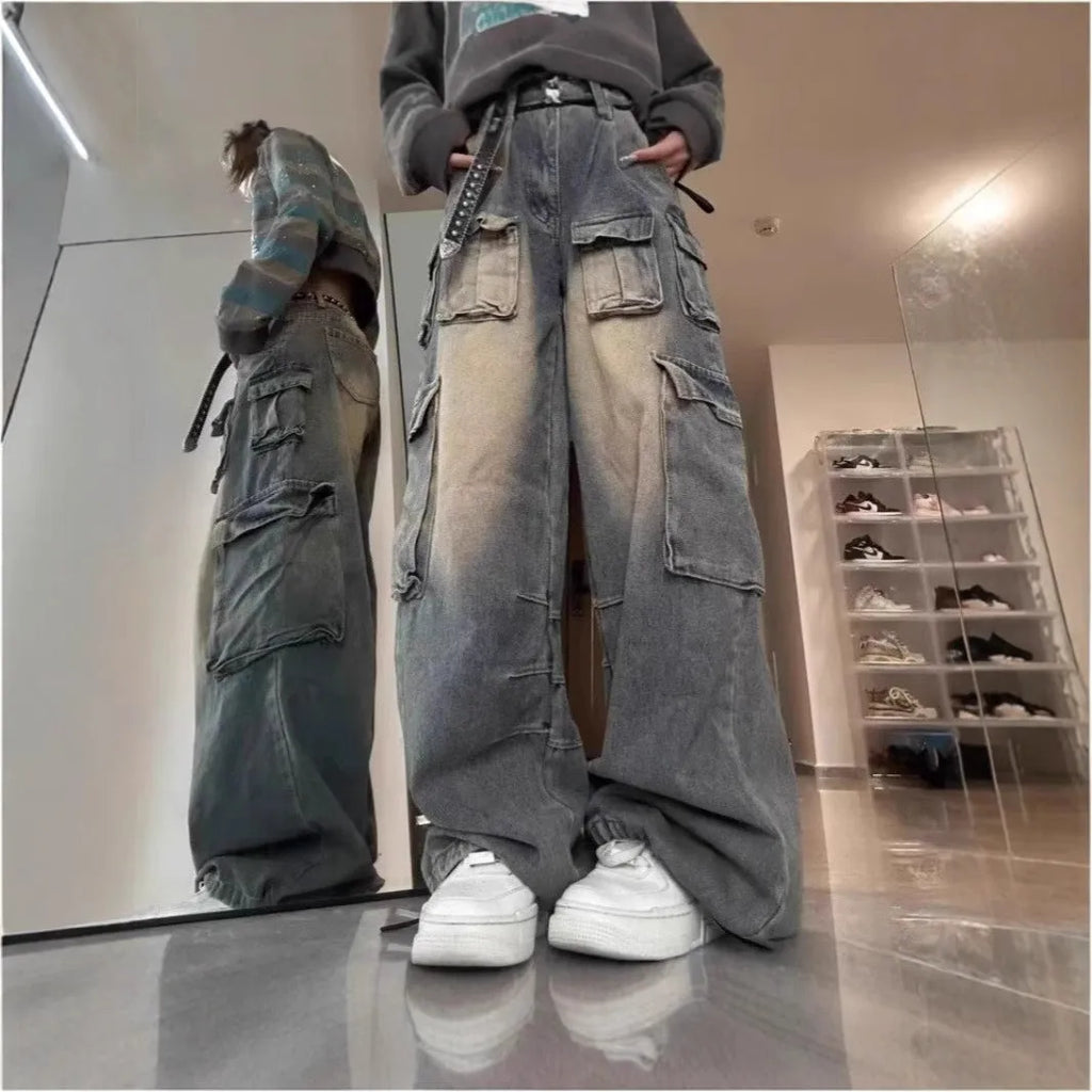 Men's loose fit straight leg distressed denim jeans with multiple pockets in tooling design