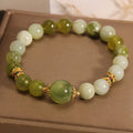 Women's bracelet in Xiuyan jade green colour with original sweet Mori design and polished finish