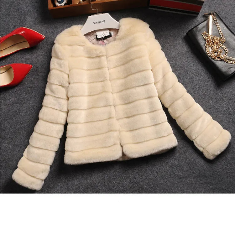 Women's short-length faux fur jumper in beige, shown with regular sleeves and a textured rabbit fur-style pile.