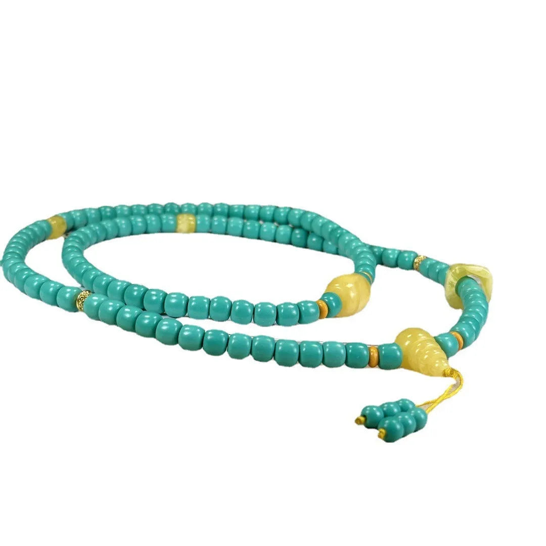 Turquoise mesh flower lucky pendant necklace with ball bead chain, adjustable length.