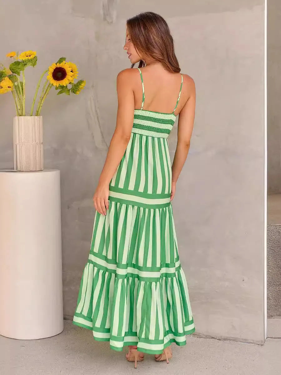 Women's long striped summer dress with suspenders, a square neckline, backless design, and side pockets.