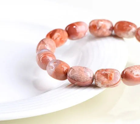Natural cherry agate barrel bead bracelet with geometric shape and ruyi charm