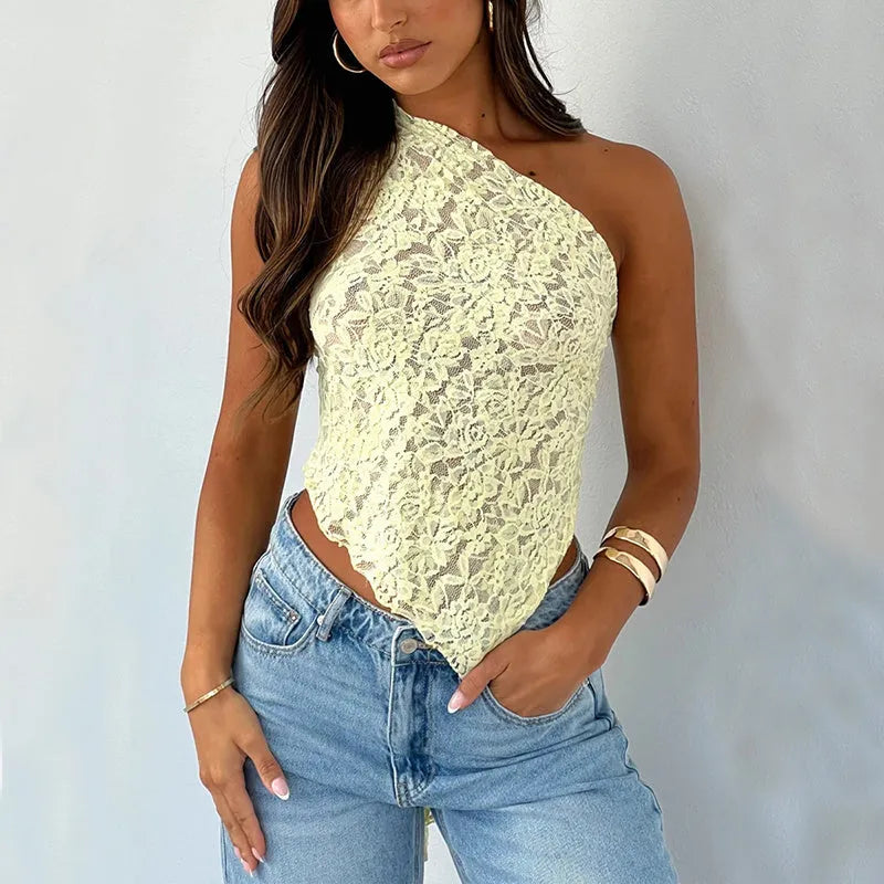 Women's apricot lace backless sleeveless top with an asymmetrical neckline on a hanger.