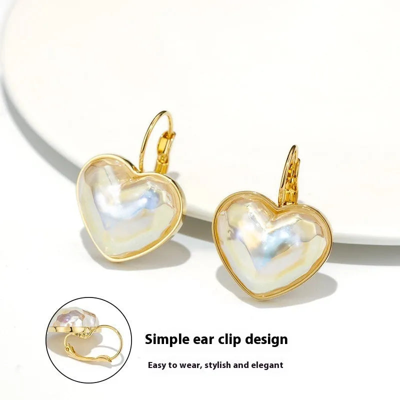 Gold-coloured alloy ear clips with summer love design and clip-on mechanism