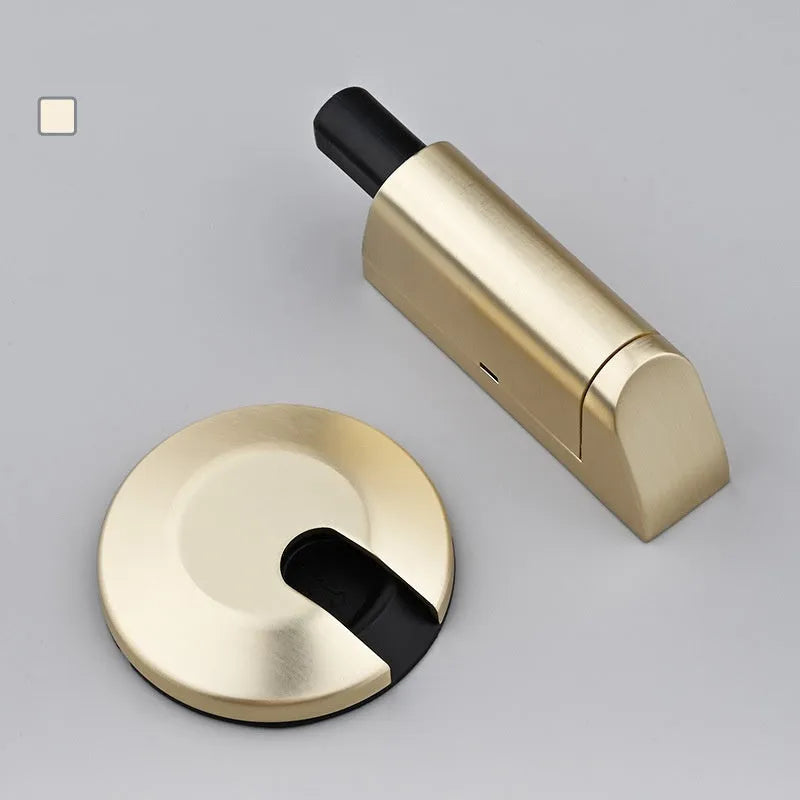 Zinc alloy invisible wedge door stopper with magnetic catch in six colour finishes.