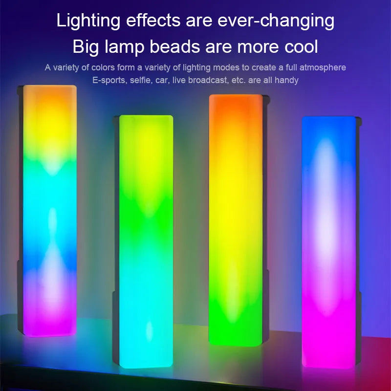 Black and white 3D RGB voice-activated music rhythm ambiance lamp on a tabletop.