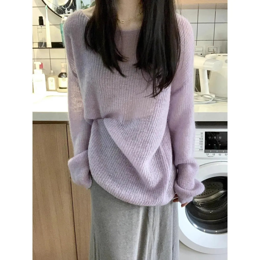 Purple lightweight women's blouse with hollow-out pattern and flared princess sleeves on a mannequin.