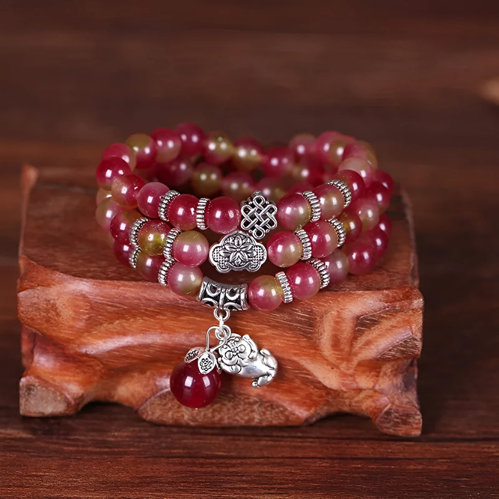 Watermelon crystal bracelet with Chinese knot fastening in 6mm or 8mm style options