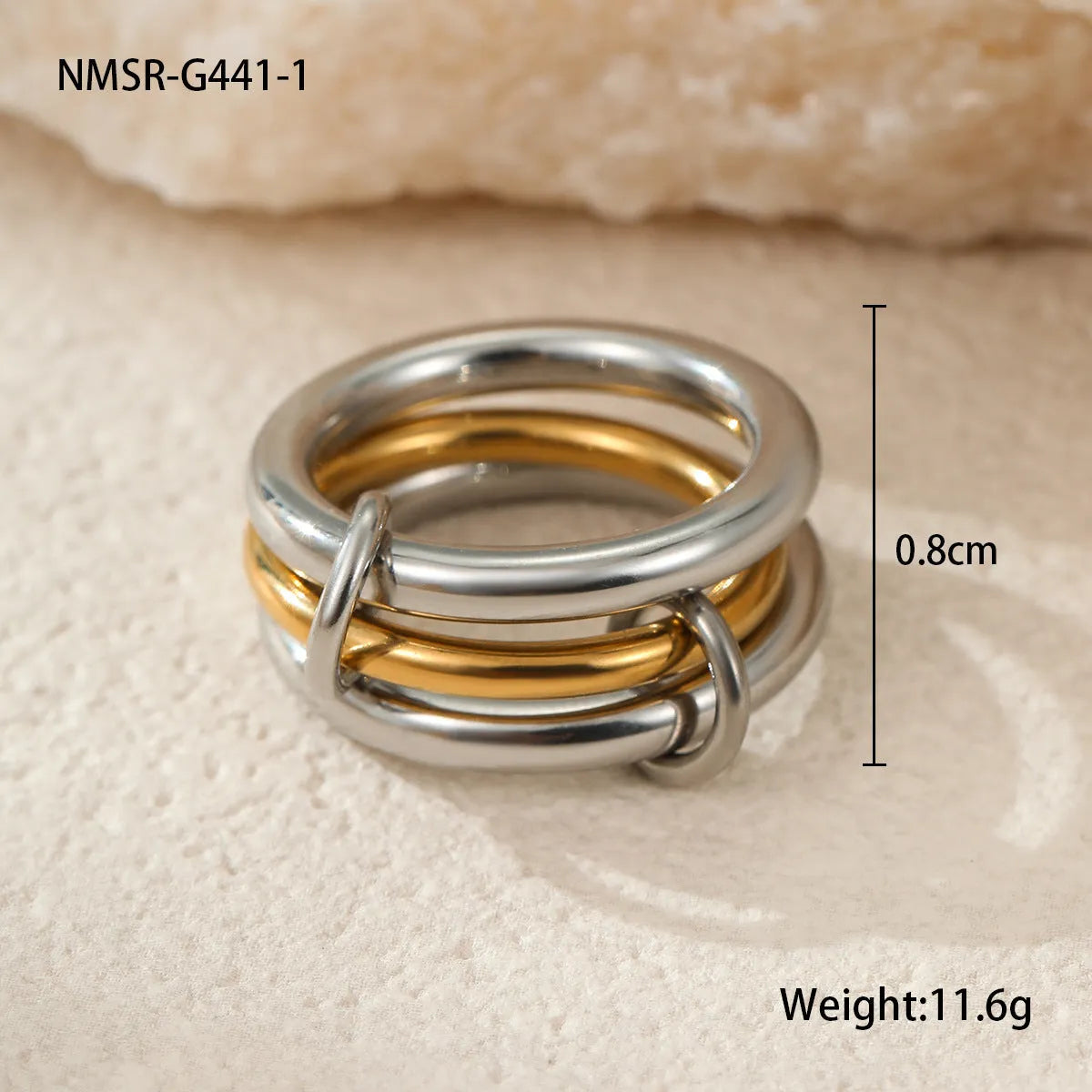 Stacked colour matching stainless steel ring set with 18K gold plating and exaggerated profile