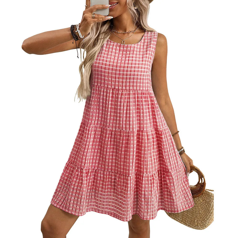 Women's light blue sleeveless plaid dress with high waist and swing skirt on a hanger.