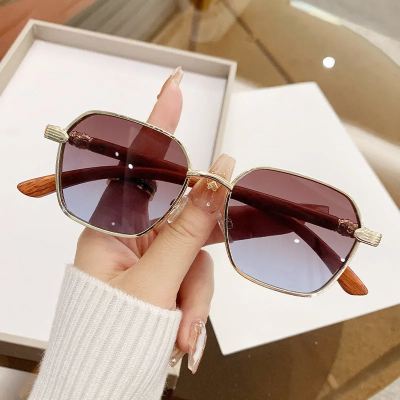 Women's frameless trim glasses with wood grain pattern and gold alloy frame.