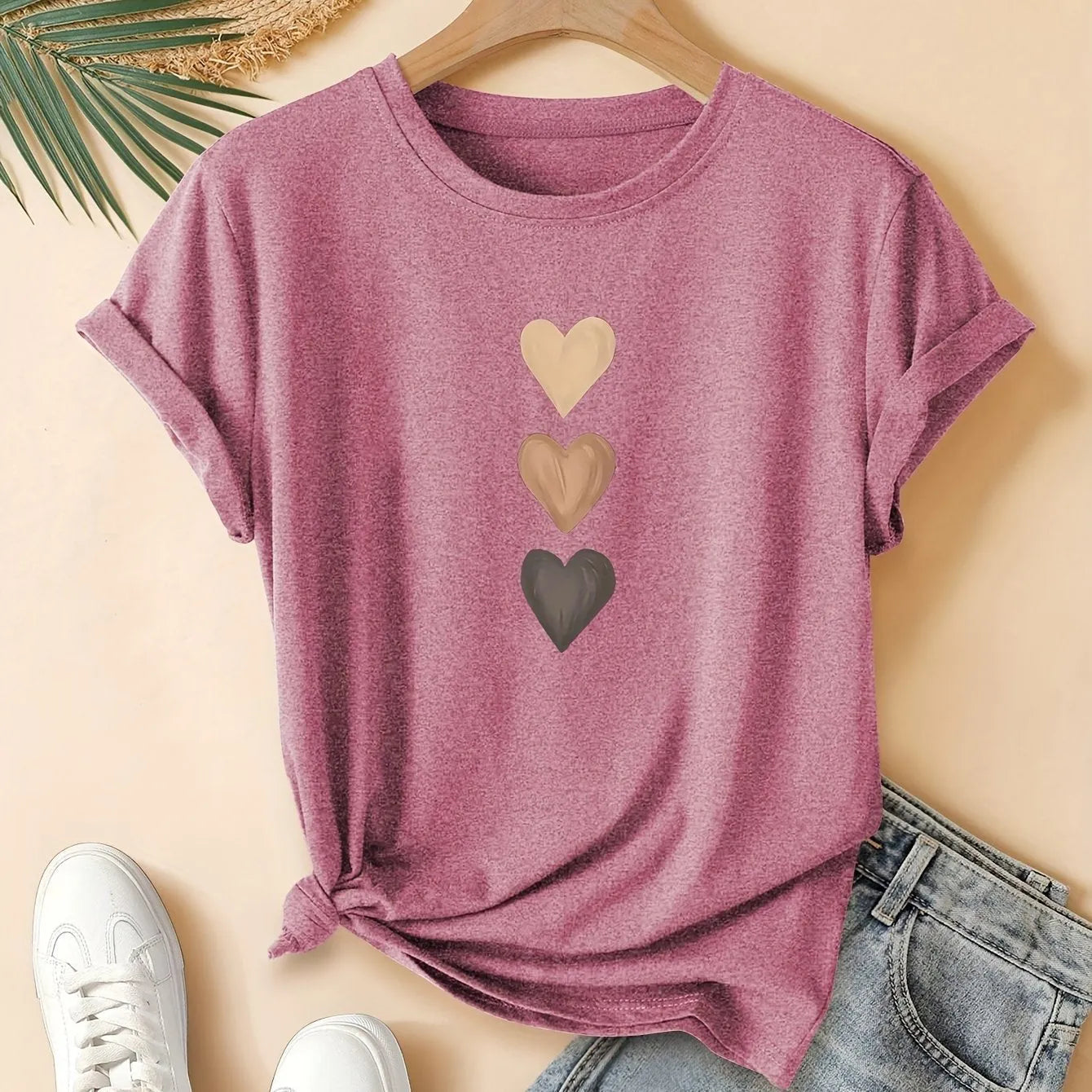 Women's art retro style printed cotton short sleeve T-shirt on a hanger.