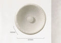 Japanese-style simple silent wall lamp with white resin shade on a wall.