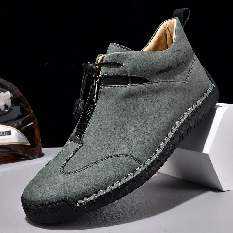 Men's black casual leather derby shoes with rubber sole and rounded toe.