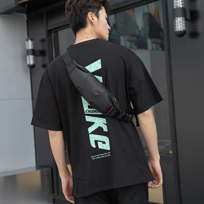 Black Oxford cloth crossbody bag with internal organisation pockets for mobile phone and ID
