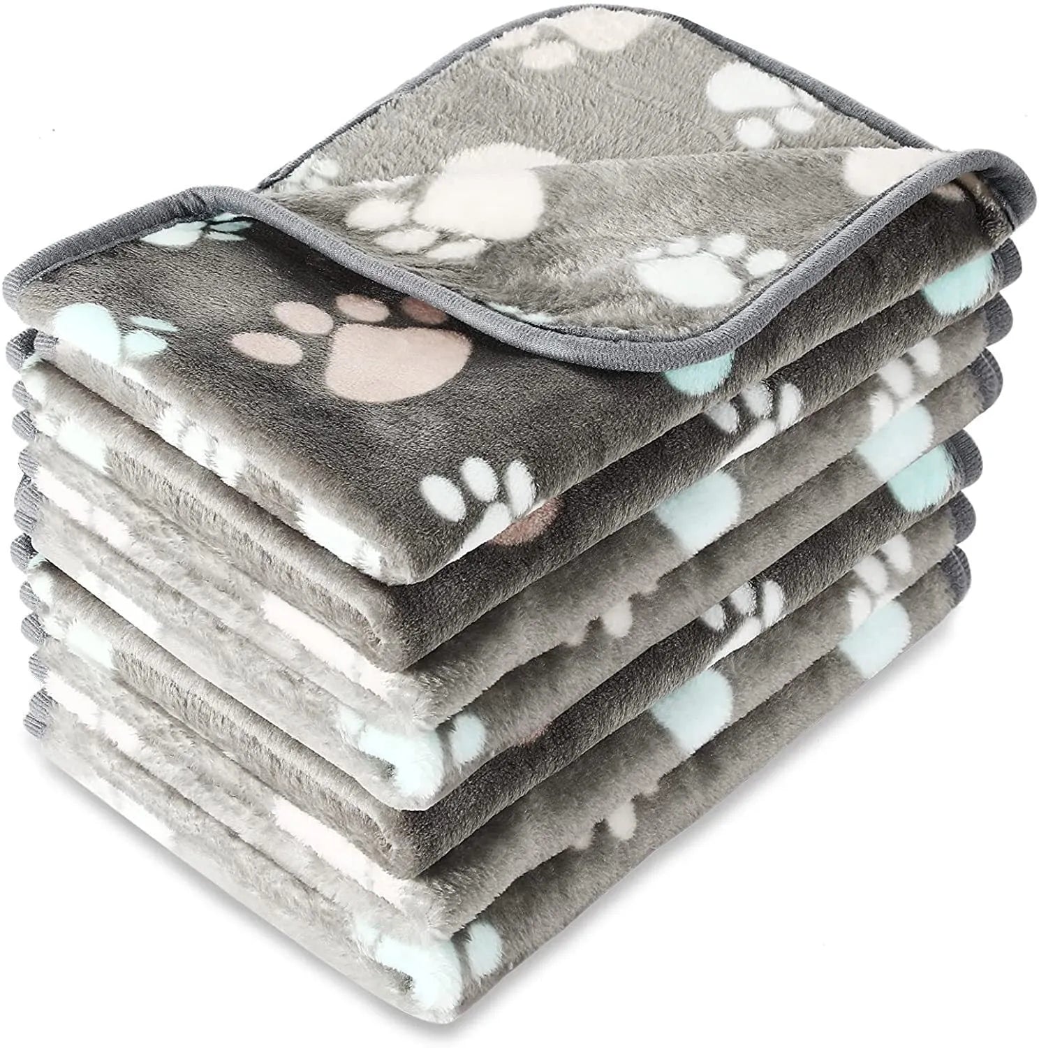 Soft coral fleece dog blanket with a paw print design, shown in a beige colour.