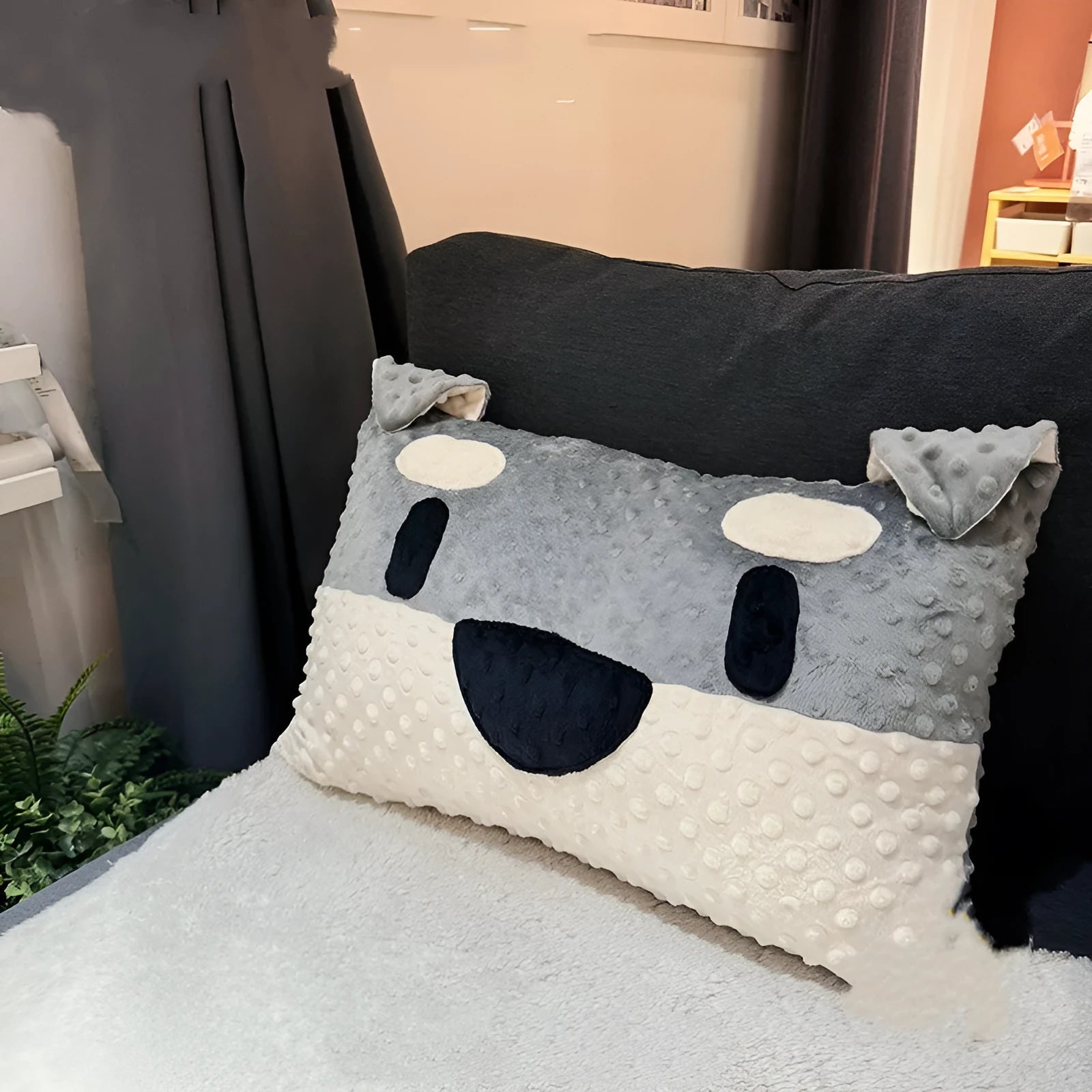 Grey schnauzer design decorative pillow on a sofa, showing 50x35x18cm size and soft fabric texture.