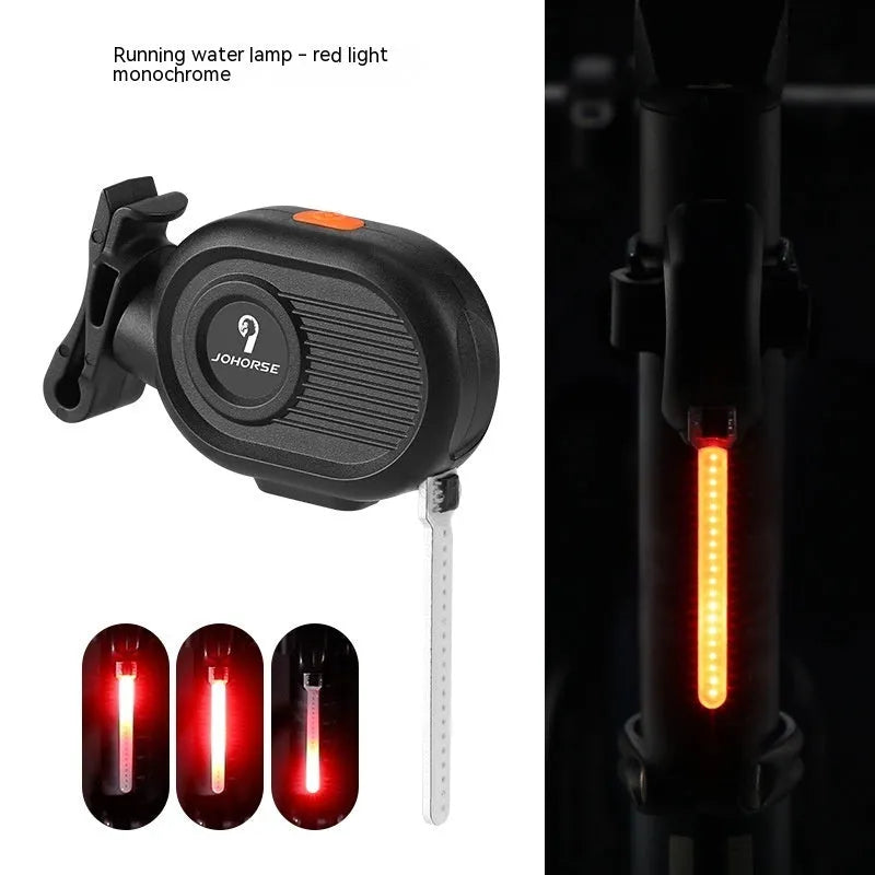 Bicycle taillight with colourful running water LED light effect mounted on a bike seat post.