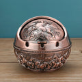 Alloy ashtray with smoke extinguishing slot in bronze finish featuring decorative dragon and phoenix design
