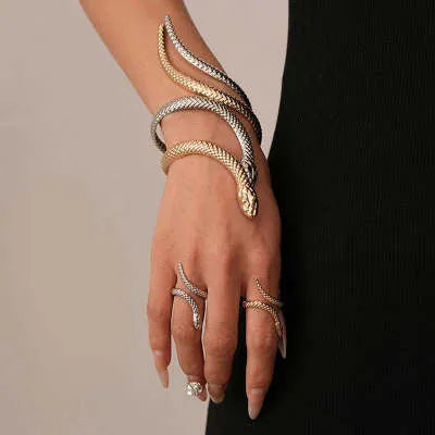 Gold and silver exaggerated twisted snake design ring and bracelet jewellery set