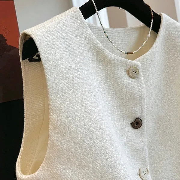 Women's round neck sleeveless vest in French bandage style, available in milky white and black colours