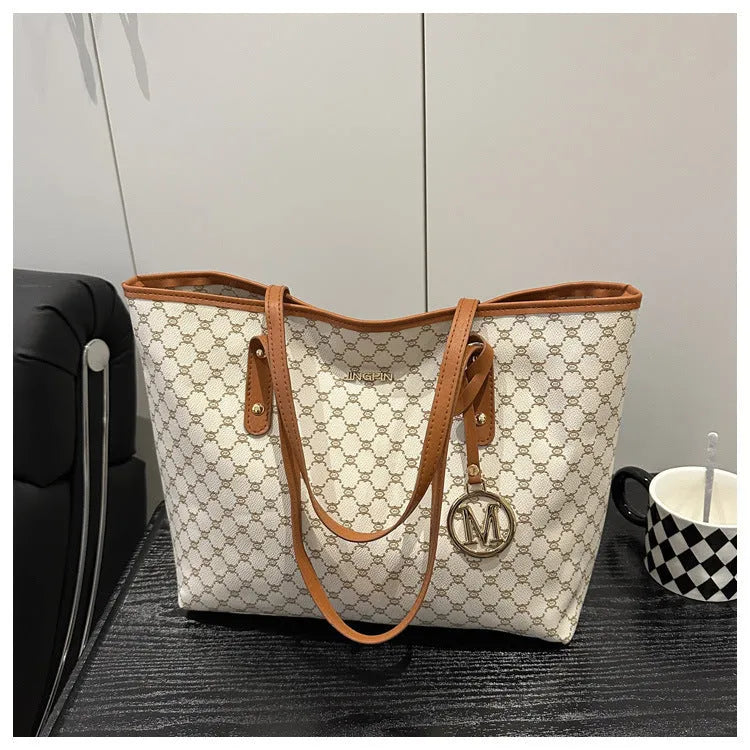 Street trend shoulder bag made from PU material with sewing thread decorative elements